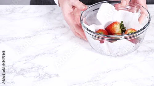 Washed and Dried Strawberries Stored Safely in a Glass Bowl