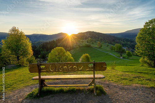 Sunrise and the famous bench with the sign “Cieńków” in Wisła