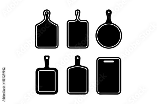 Set of six black and white cutting boards with various shapes and handles