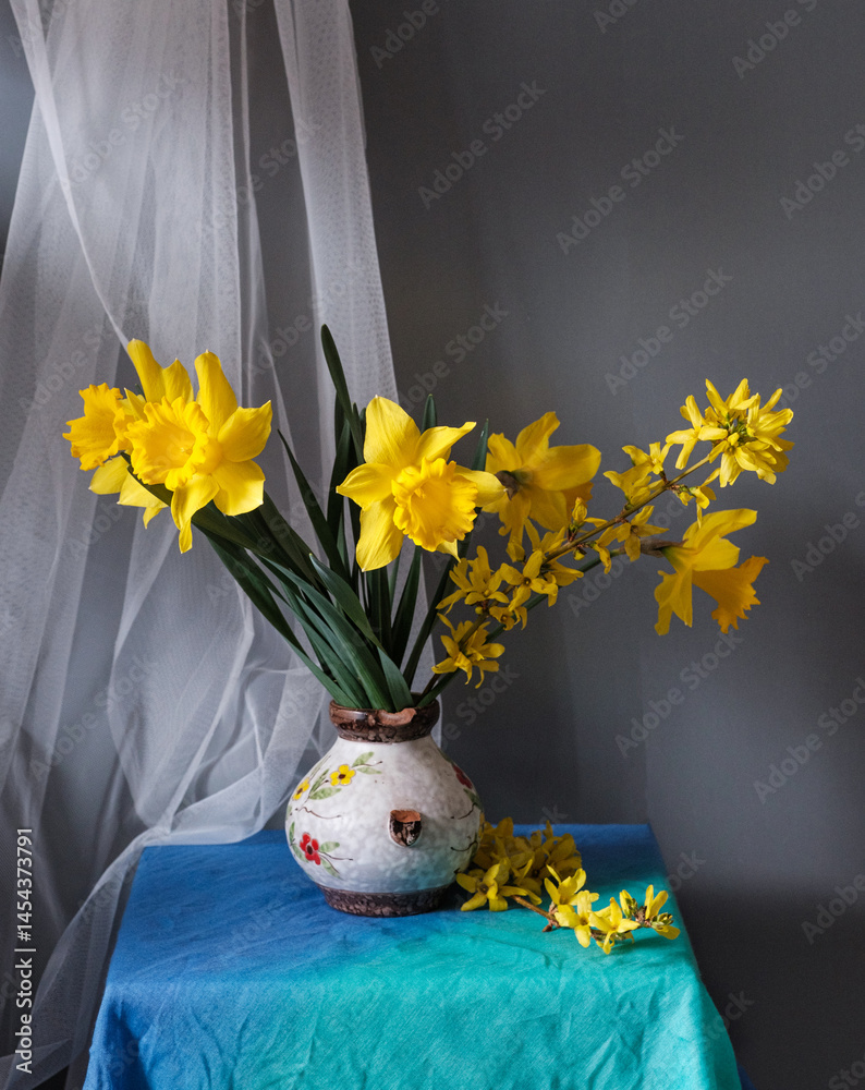 A stunning display of vibrant yellow flowers beautifully arranged in a vintage pitcher