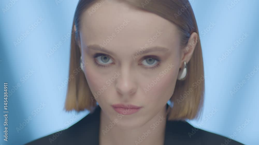 A thoughtful woman in a modern studio, gently posing with eyes closed and open. Calm, elegant, and ideal for wellness, luxury, and branding themes. A thoughtful woman in a modern studio, gently posing with eyes closed and open. Calm, elegant, and ideal for wellness, luxury, and branding themes.