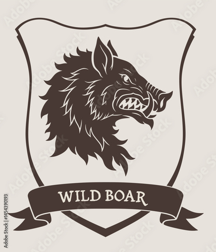 Vector heraldic wild boar head in the shield with ribbon and lettering. 