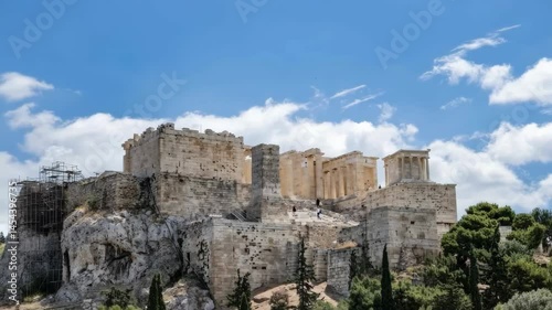 Ancient Greek temple ruins, marble stone buildings on a hill, archaeological site, blue cloudy sky