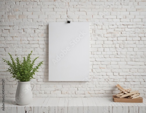 Stylish poster mockup with clothespins on a white brick wall  Home interior detail , overhead, clothespins