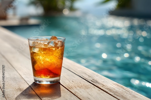 Refreshing Cocktail by Poolside with Melting Ice Cubes Under Sunlight