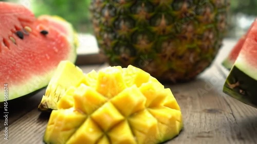Fresh Tropical Fruits Arrangement on a Rustic Wooden Surface Perfect for Summer