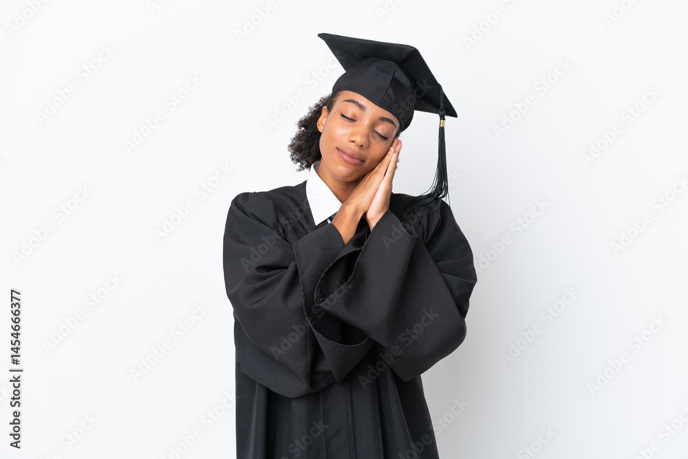Young university graduate African American woman isolated on white background making sleep gesture in dorable expression Young university graduate African American woman isolated on white background making sleep gesture in dorable expression
