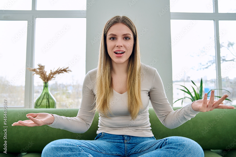 Web cam view of young woman talking looking in camera, online meeting, video call
