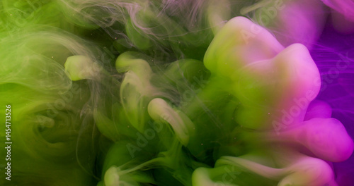 Color fog. Pigment wave. Neon purple green paint haze dissolving in water. Mystic bright smoke abstract defocused swirl mix background.