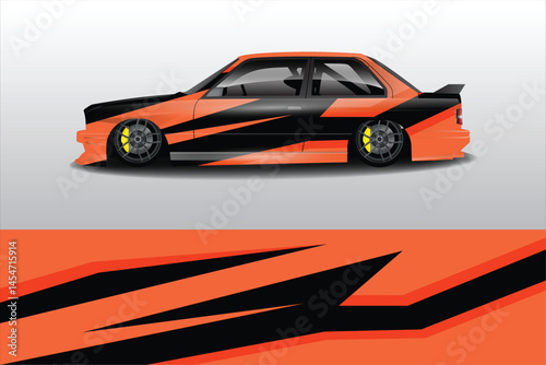 Sleek orange and black sports car with dynamic design