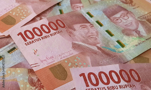 Indonesian rupiah banknotes series with the value of one hundred thousand rupiah IDR 100.000 issued since 2022, Indonesian rupiah for background