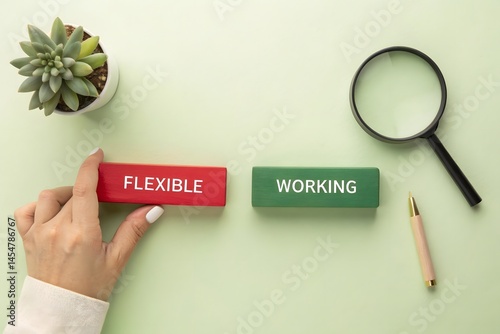 Flexible Working. Work arrangements that allow employees to have some control over when, where, and how they work, rather than adhering to a traditional schedule. Wooden blocks with inscription