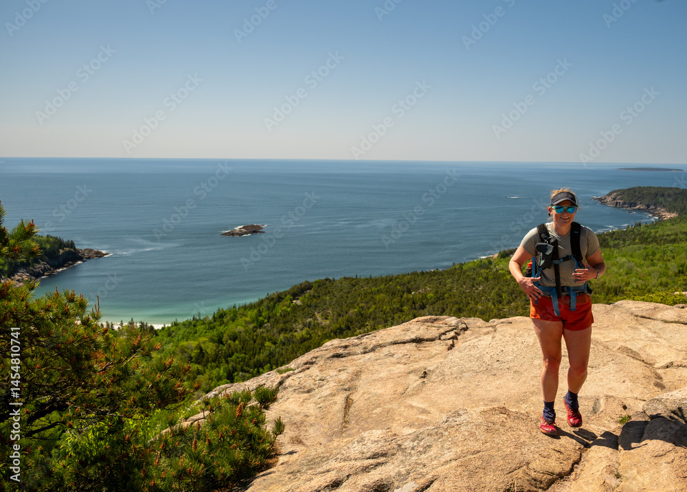 Woman Reaches Granite Slab on Champlain Mountain