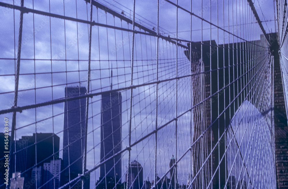 View of the Twin Towers from the Brooklyn Bridge in NYC from the 1980s.