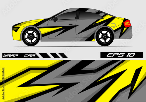 Car wrap design featuring dynamic yellow and gray patterns