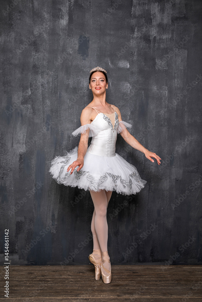 Fototapeta premium Studio portrait of a ballerina in a white tutu