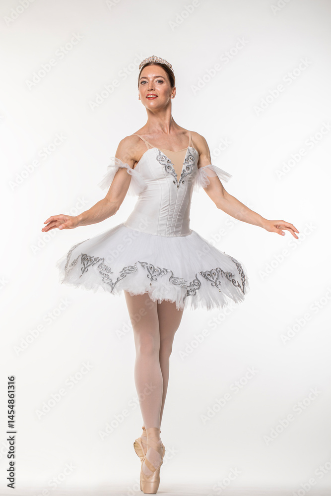 Studio portrait of a ballerina in a white tutu Studio portrait of a ballerina in a white tutu