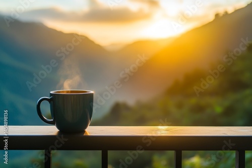 Steaming coffee mug with scenic mountain sunrise view