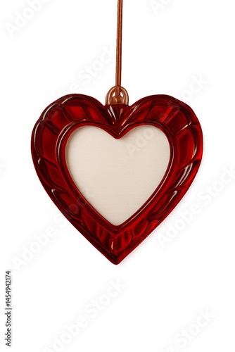 Elegant Red Heart-Shaped Decoration Hanging Against a White Background