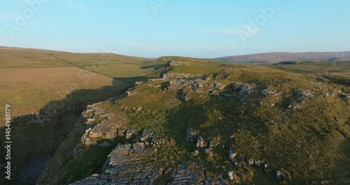 unrise over limestone hills in Yorkshire Dales