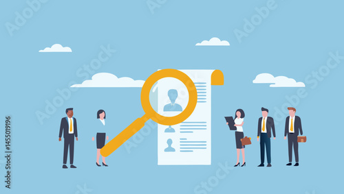 People standing around a large resume with a magnifying glass over the top image