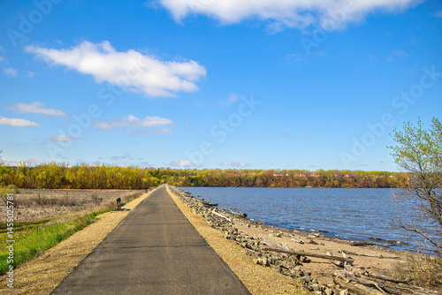 Wallpaper Mural Sunny Spring landscape view of the Mississippi River Greenway Trail crossing a levee near Hastings, Minnesota. Torontodigital.ca