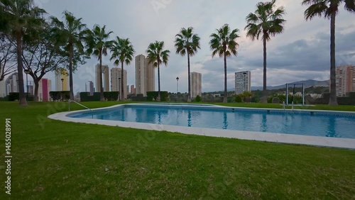 Wallpaper Mural A Picturesque Poolside View Accompanied by Stunning Modern Skyscrapers in the City Torontodigital.ca