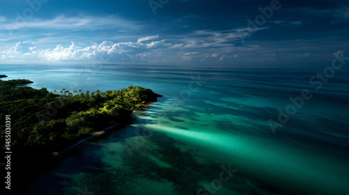 A tranquil aeriform persuasion of a tropical island paradise with turquoise waters and lush verdure under a shiny blue sky.