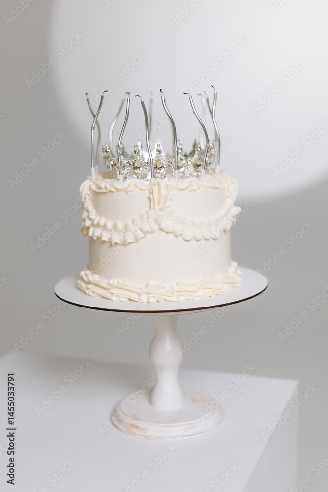 Sweet fresh cake with candles on it. Beautiful exclusive cake with protein cream. Candles on the cake. Birthday dessert