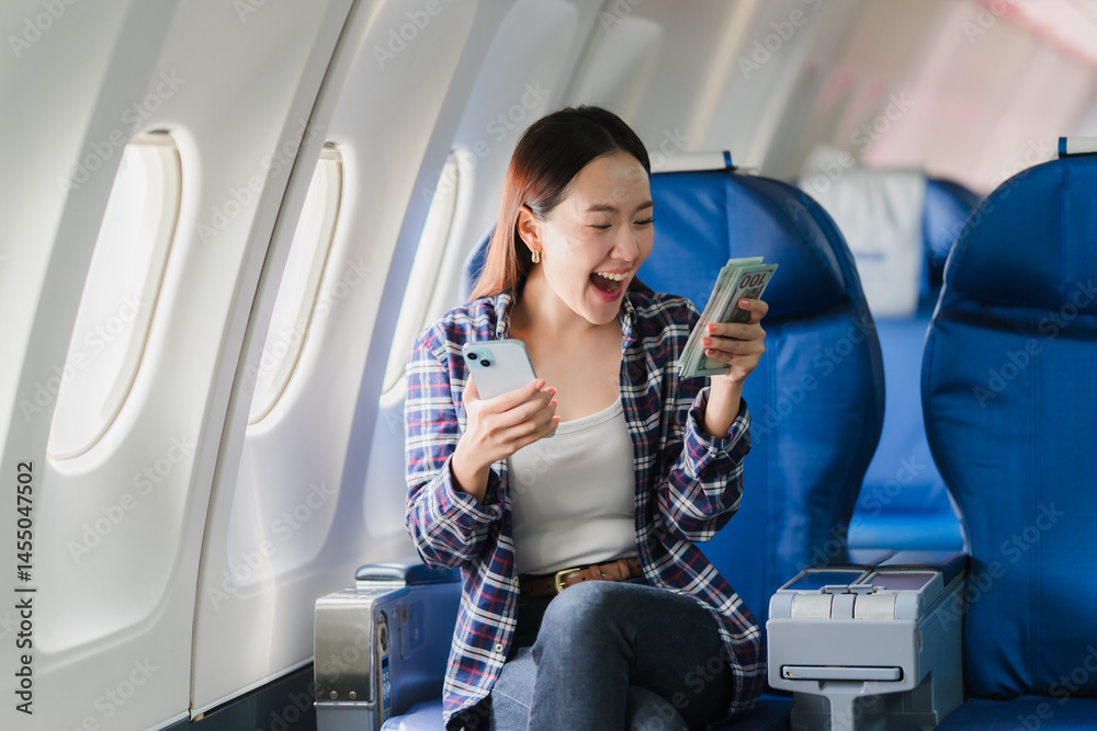 Excited Woman with Money on Airplane