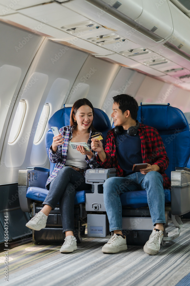 Couple Traveling by Airplane