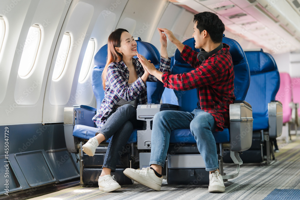 Couple Enjoying Airplane Travel