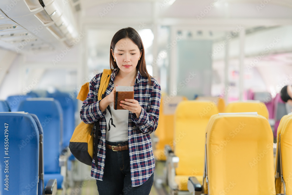 Asian Woman Traveling by Airplane