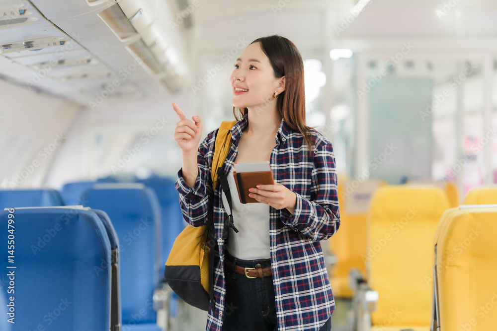 Asian Woman Traveling by Airplane