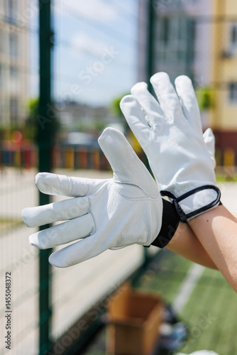 Obraz na płótnie Construction gloves. Durable gloves for dirty work. Garden gloves. Rubberized construction gloves. w salonie