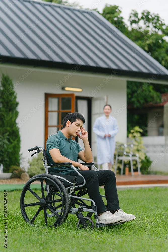 Man in Wheelchair with Caregiver at Home Man in Wheelchair with Caregiver at Home
