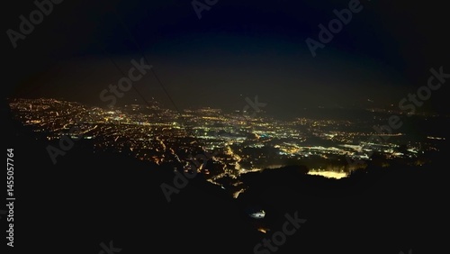 The city of Liberec at night, view from the mountain with zoom