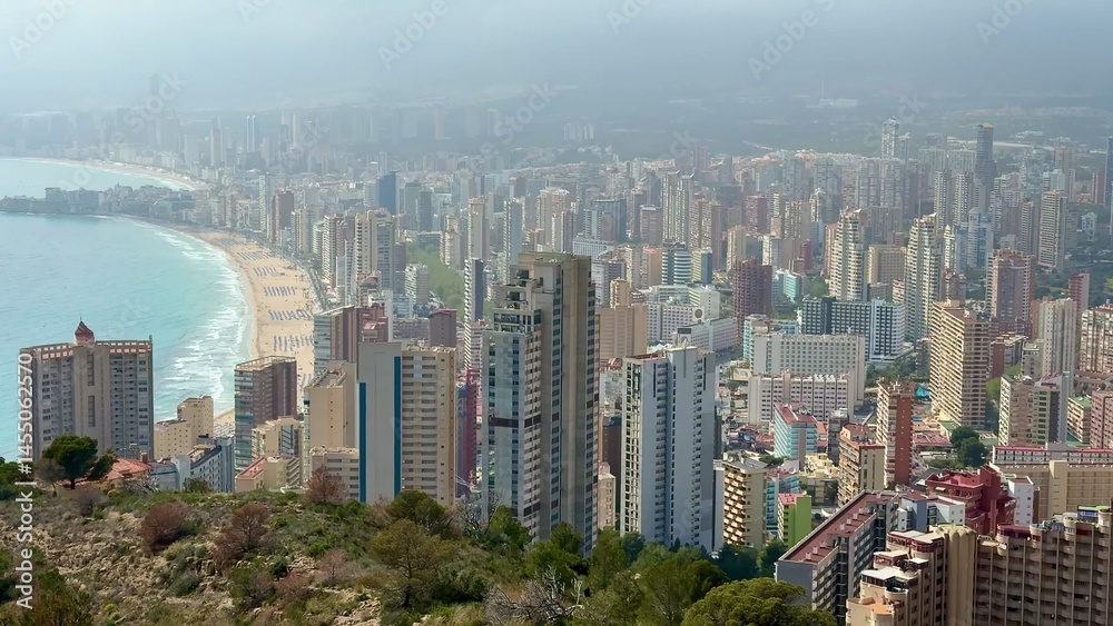 Fototapeta premium A Stunning Aerial View of a Coastal City Featuring Impressive Skyscrapers and a Beautiful Beach