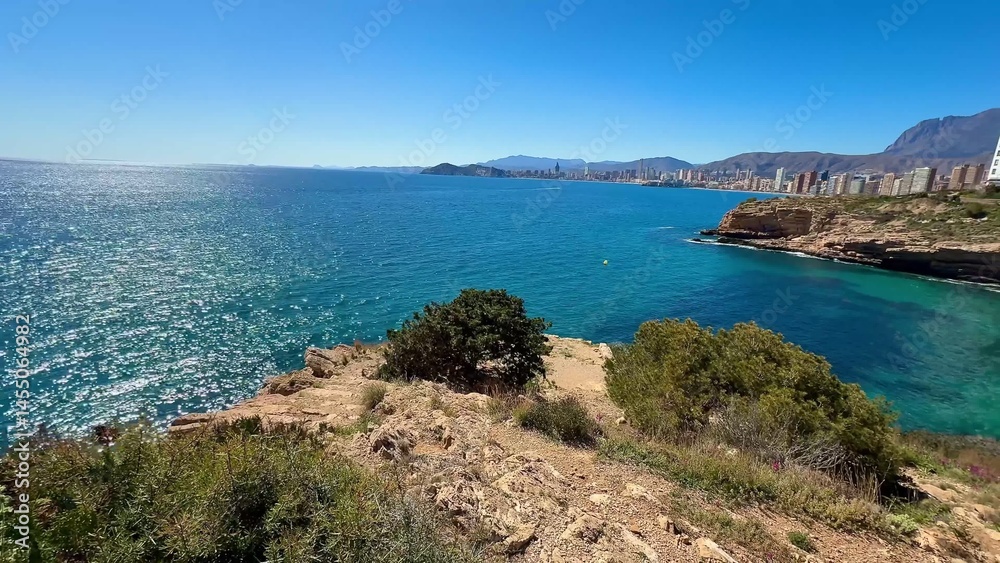 Experience the Stunning Coastal Views of Calpe, Spain, from the mesmerizing Rocky Promenade Experience the Stunning Coastal Views of Calpe, Spain, from the mesmerizing Rocky Promenade