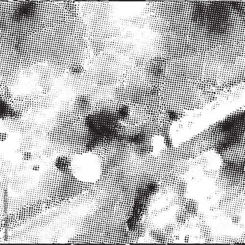 A dense collection of small dark dots appears on a white background.