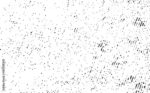 A vast textured expanse of dark gray dots against a bright white background.