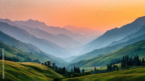   A scenic view of a pine-forested valley set against mountainous backdrops during sunset