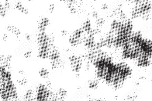 A textured black silhouette of a tree branch against a white background.