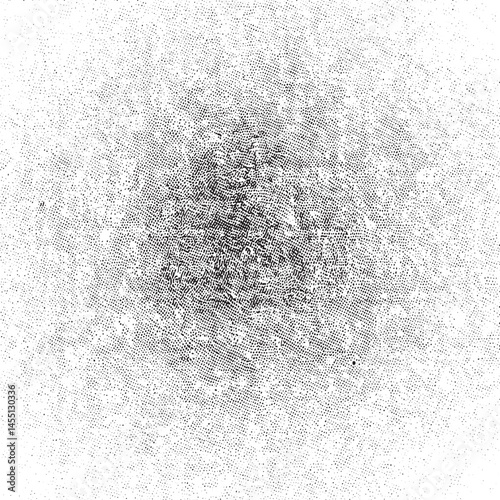 A dense cluster of small dark dots radiates outward from a central point on a light background.