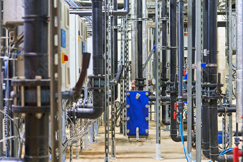 Detailed Interior View of a Complex Industrial Piping and Plumbing System