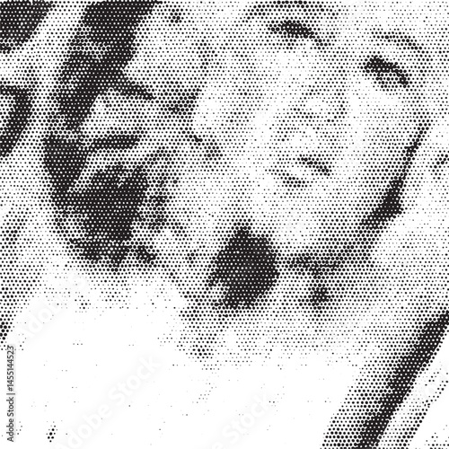 A young woman’s face is partially revealed through a textured black and white dot .