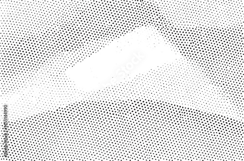 A stark white triangle sharply illuminates a distant rolling landscape.