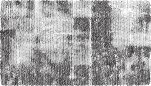 A grayscale portrait of a contemplative person viewed through a textured halftone .