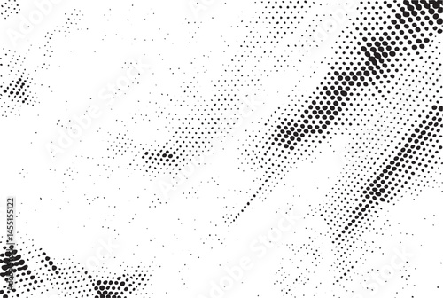 A dynamic of black dots contrasts against a bright white background.