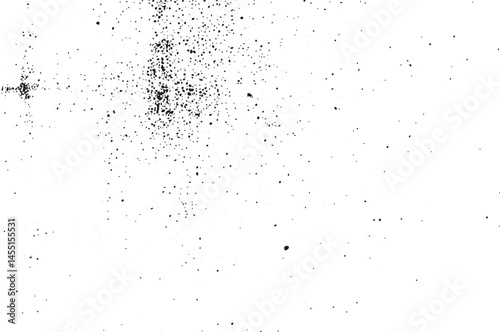 A large scattered collection of dark dots covers a white background.
